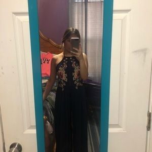 Navy romper with floral design